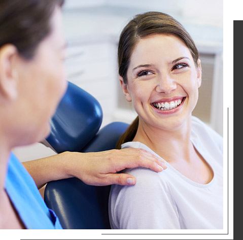 Patient smiling at her dentist